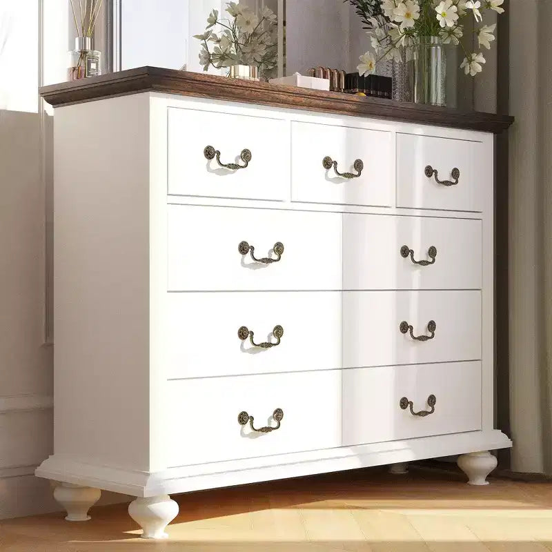 Bedroom vanity with intricately carved metal handles, featuring a tall cabinet with wooden legs. Suitable for bedrooms, living rooms, and hallways.