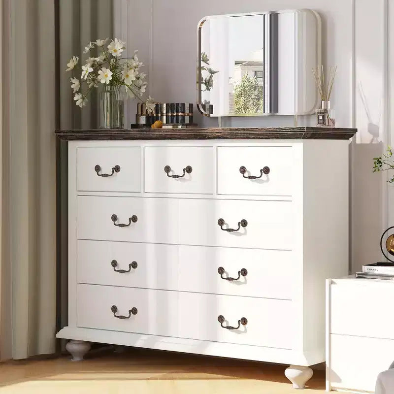 Bedroom vanity with intricately carved metal handles, featuring a tall cabinet with wooden legs. Suitable for bedrooms, living rooms, and hallways.